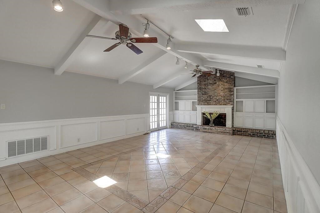 6426 Long Circle Corpus Christi, TX 78413 - Photo 18 of 40 a view of an empty room and fire place