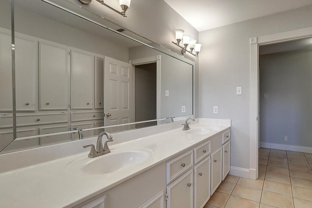 6426 Long Corpus Christi, TX 78413 - Photo 24 of 37 a bathroom with a sink and a mirror
