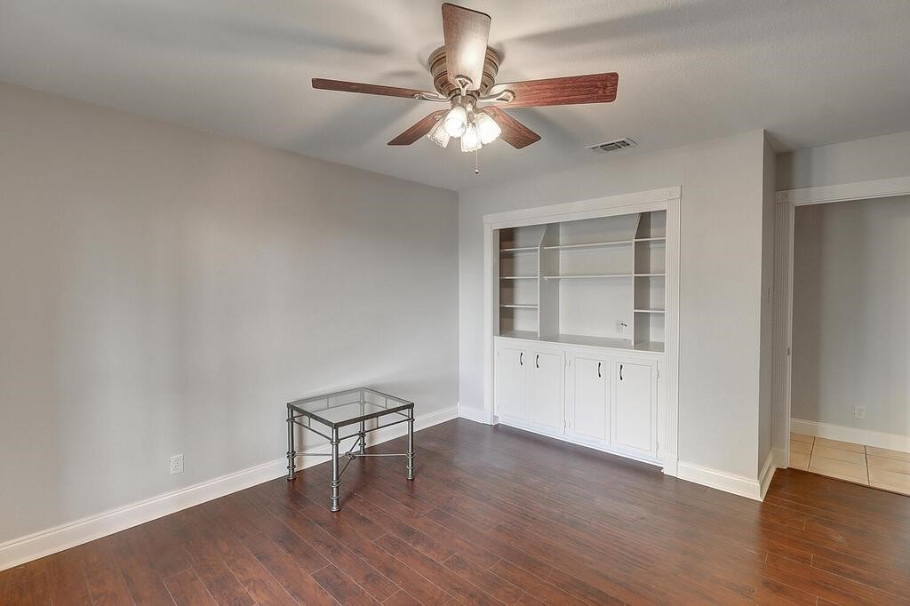 6426 Long Corpus Christi, TX 78413 - Photo 26 of 37 wooden floor in an empty room with a window