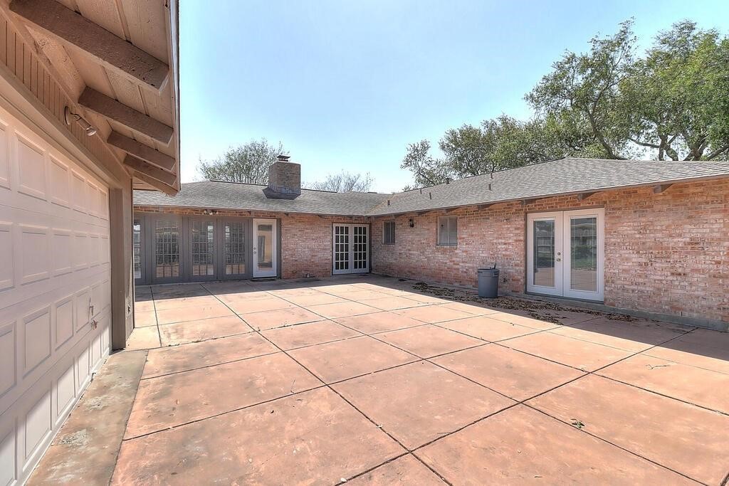 6426 Long Corpus Christi, TX 78413 - Photo 31 of 37 a view of backyard with garage