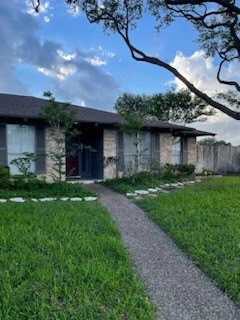 6426 Long Circle Corpus Christi, TX 78413 - Photo 40 of 40 a front view of a house with garden