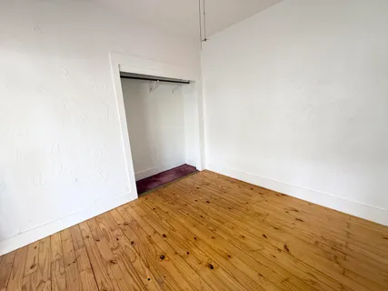 an aerial view of residential house with outdoor space and parking