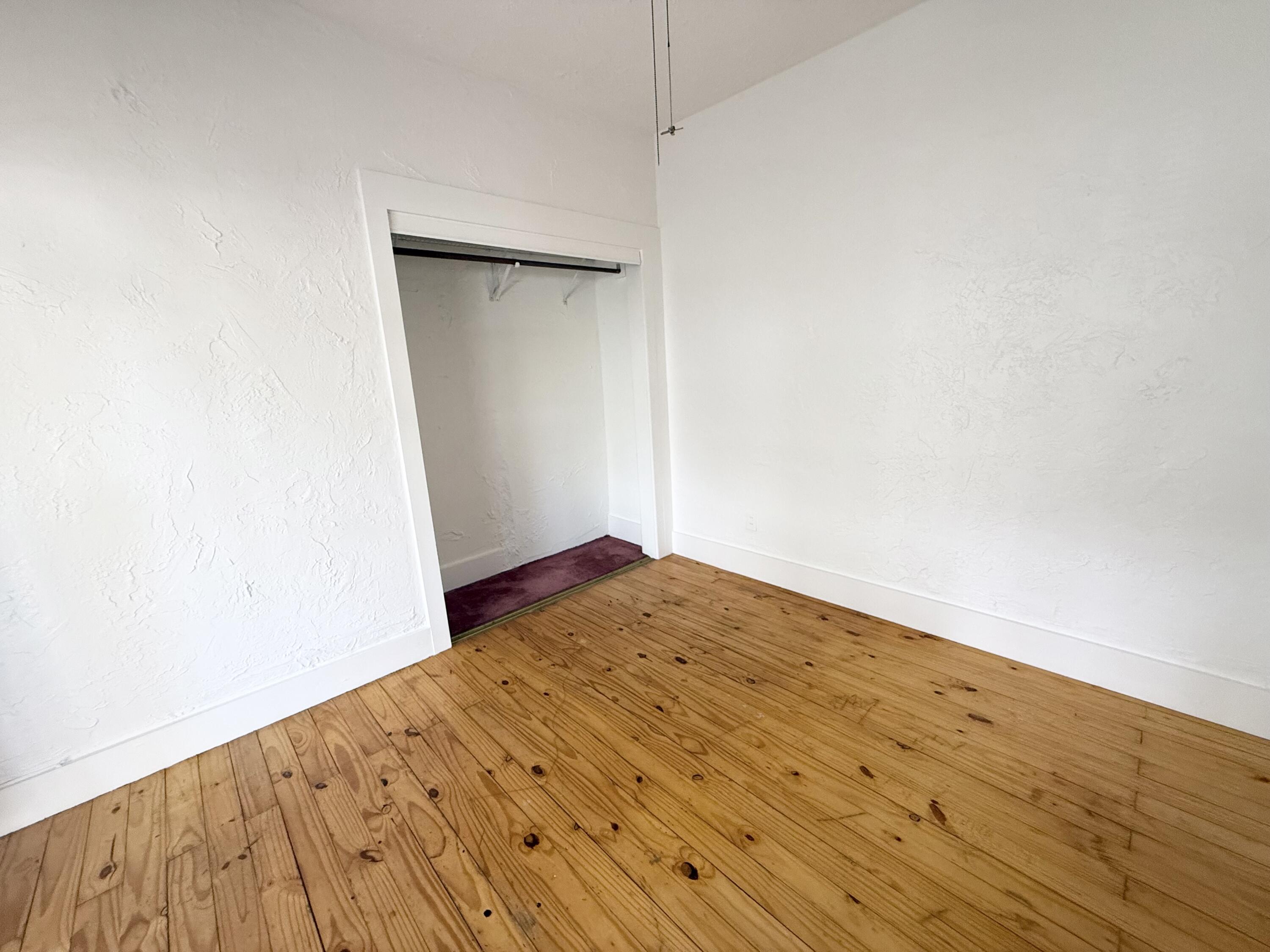 311 Wildermere Road West Palm Beach, FL 33401 - Photo 27 of 87 a view of empty room with wooden floor