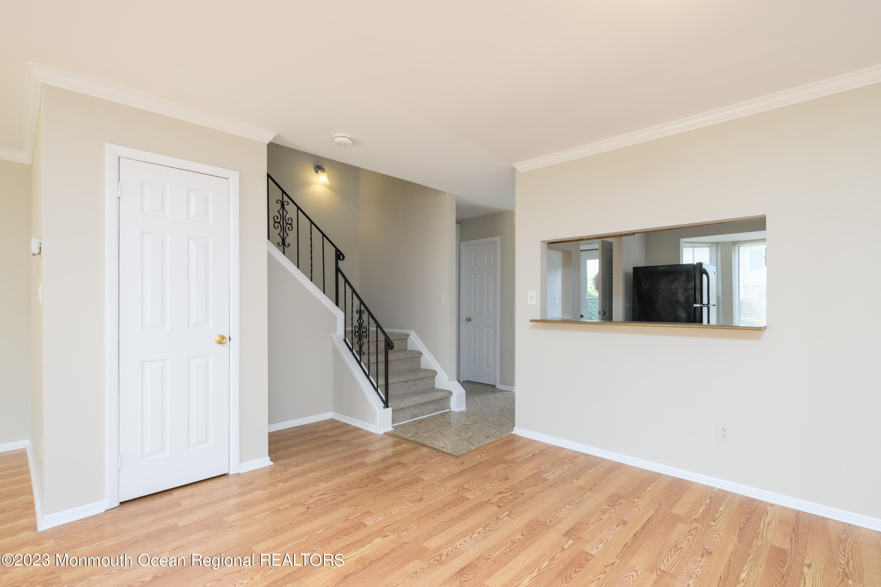 60 County Road, Unit J64 Cliffwood, NJ 07721 - Photo 8 of 21 a view of a livingroom with wooden floor and stairs