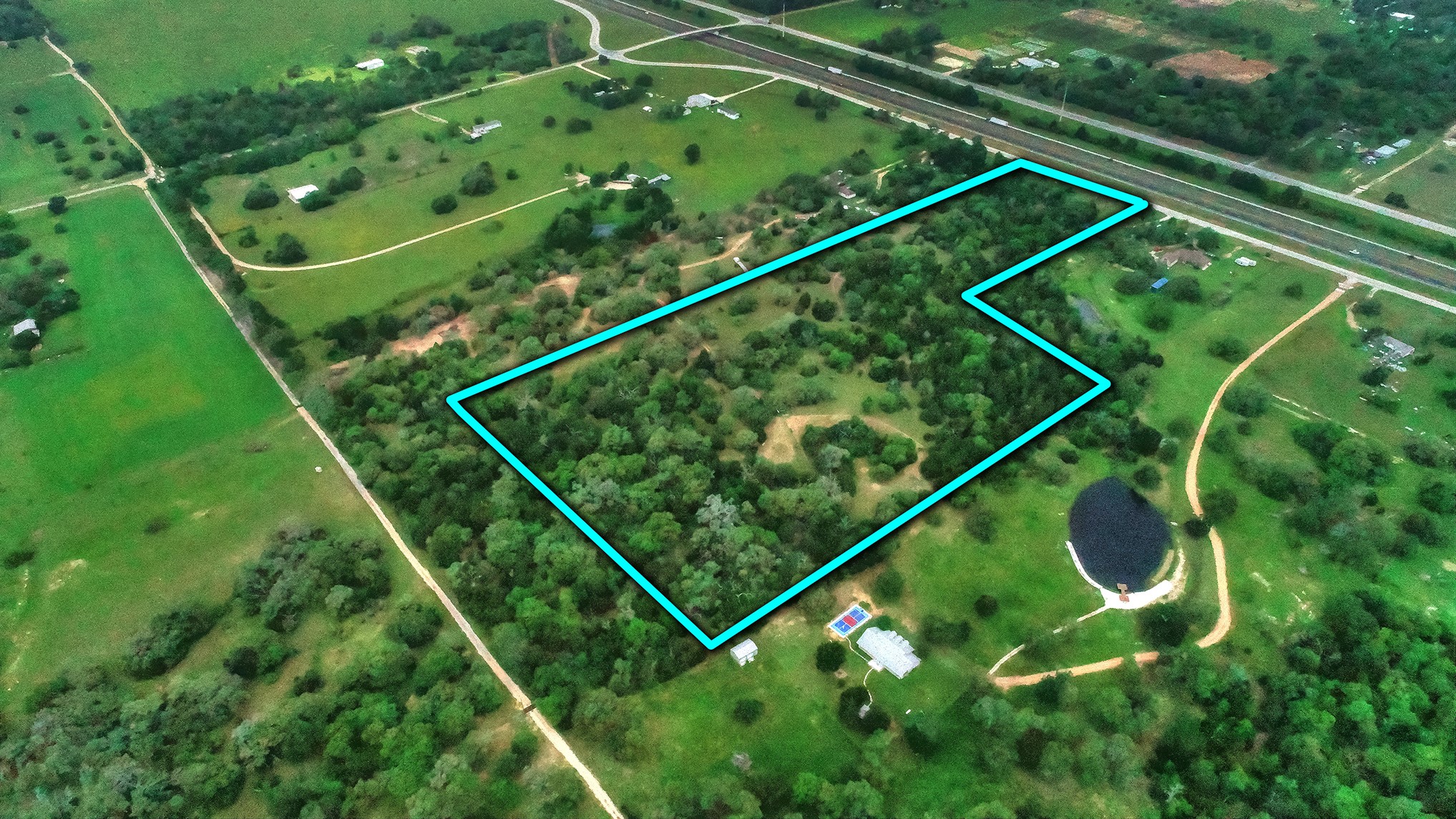 10 East Frontage Road Weimar, TX 78962 - Photo 9 of 30 a park with lots of trees and plants