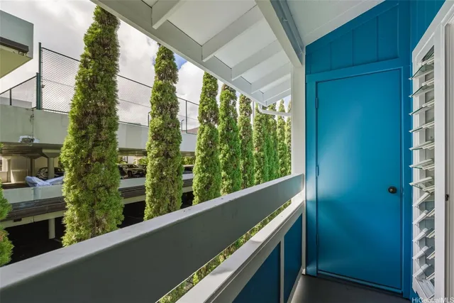 a view of a balcony with an outdoor space