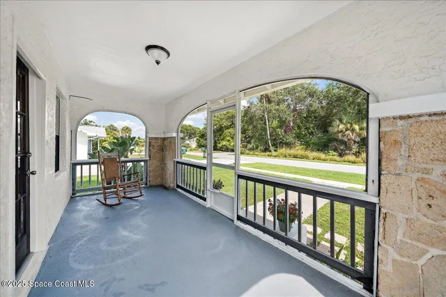 a view of an entryway with hardwood