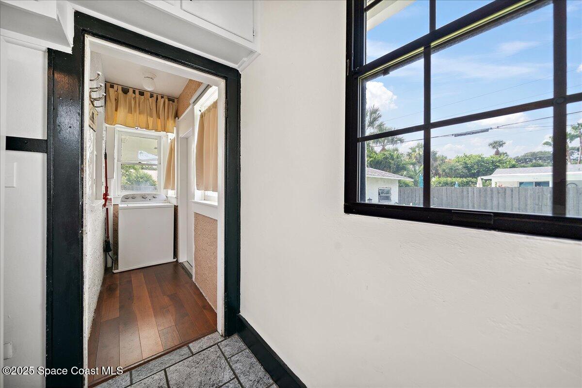 415 2nd Avenue Indialantic, FL 32903 - Photo 36 of 51 a view of a hallway with wooden floor and a dining room