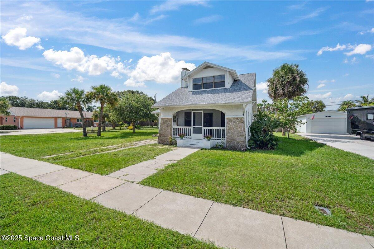 415 2nd Avenue Indialantic, FL 32903 - Photo 10 of 51 a view of a house with a yard