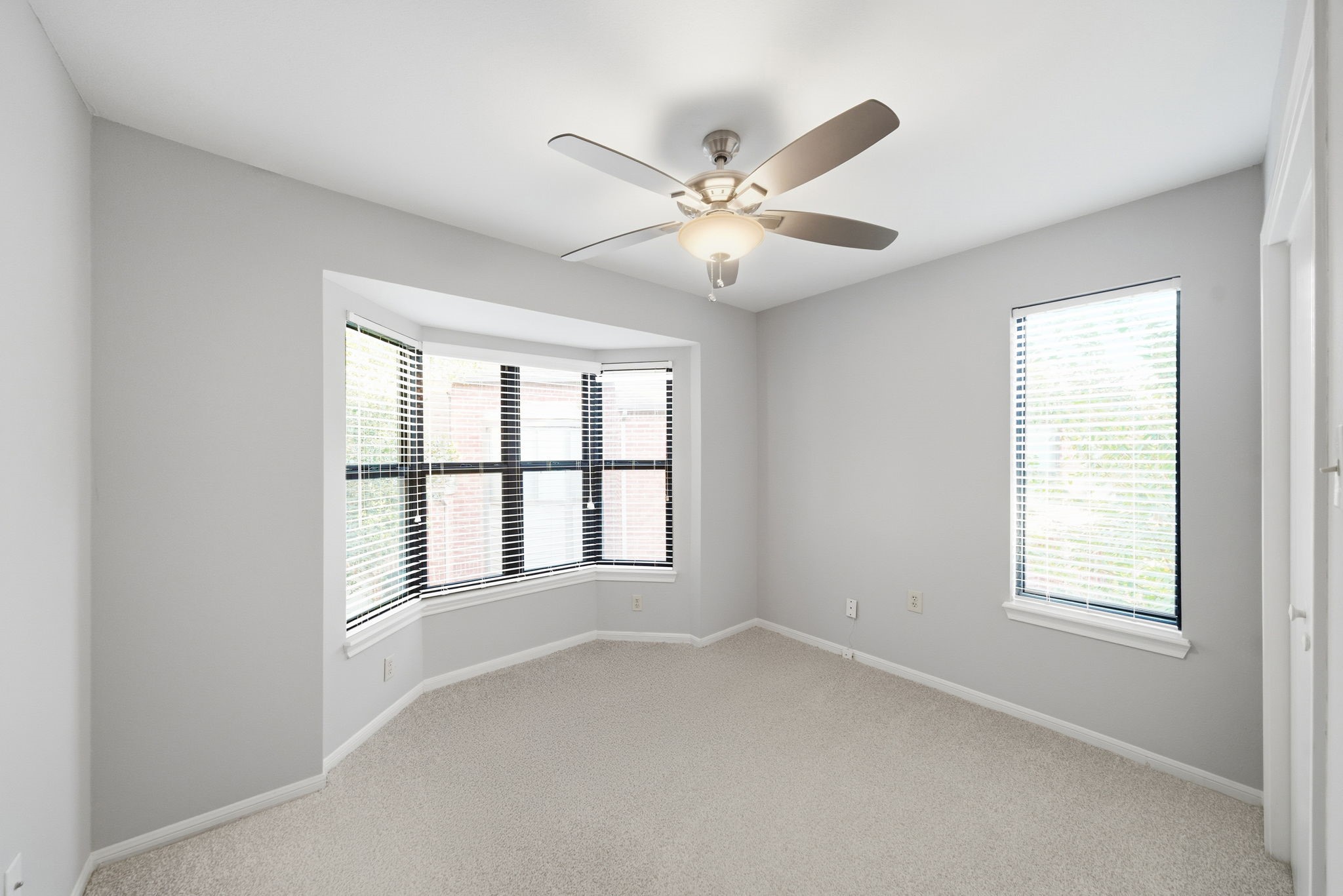 7447 Cambridge Street, Unit 65 Houston, TX 77054 - Photo 24 of 42 a view of an empty room with a window