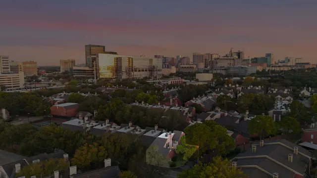 a view of a city with tall buildings
