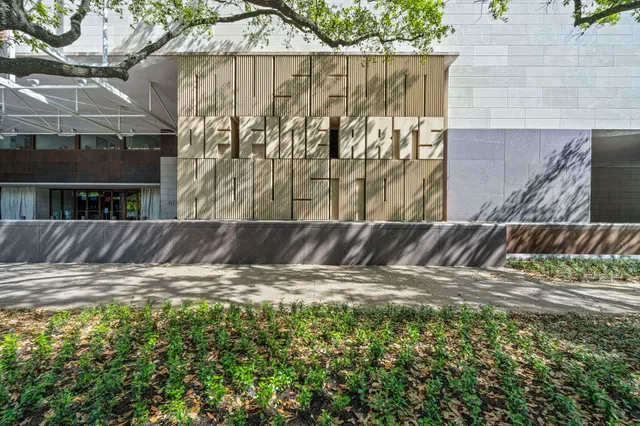 a view of a swimming pool with a yard