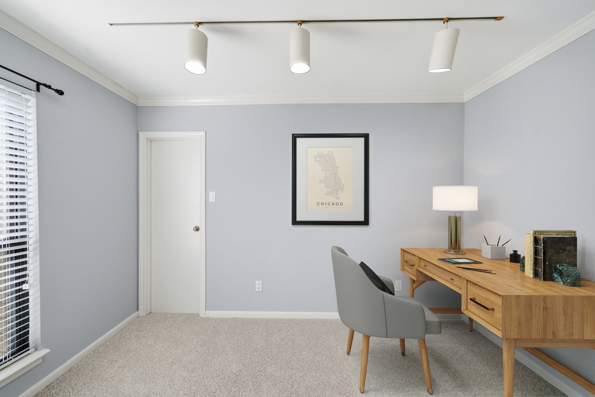 7447 Cambridge Street, Unit 65 Houston, TX 77054 - Photo 5 of 42 a workspace with furniture and lamp