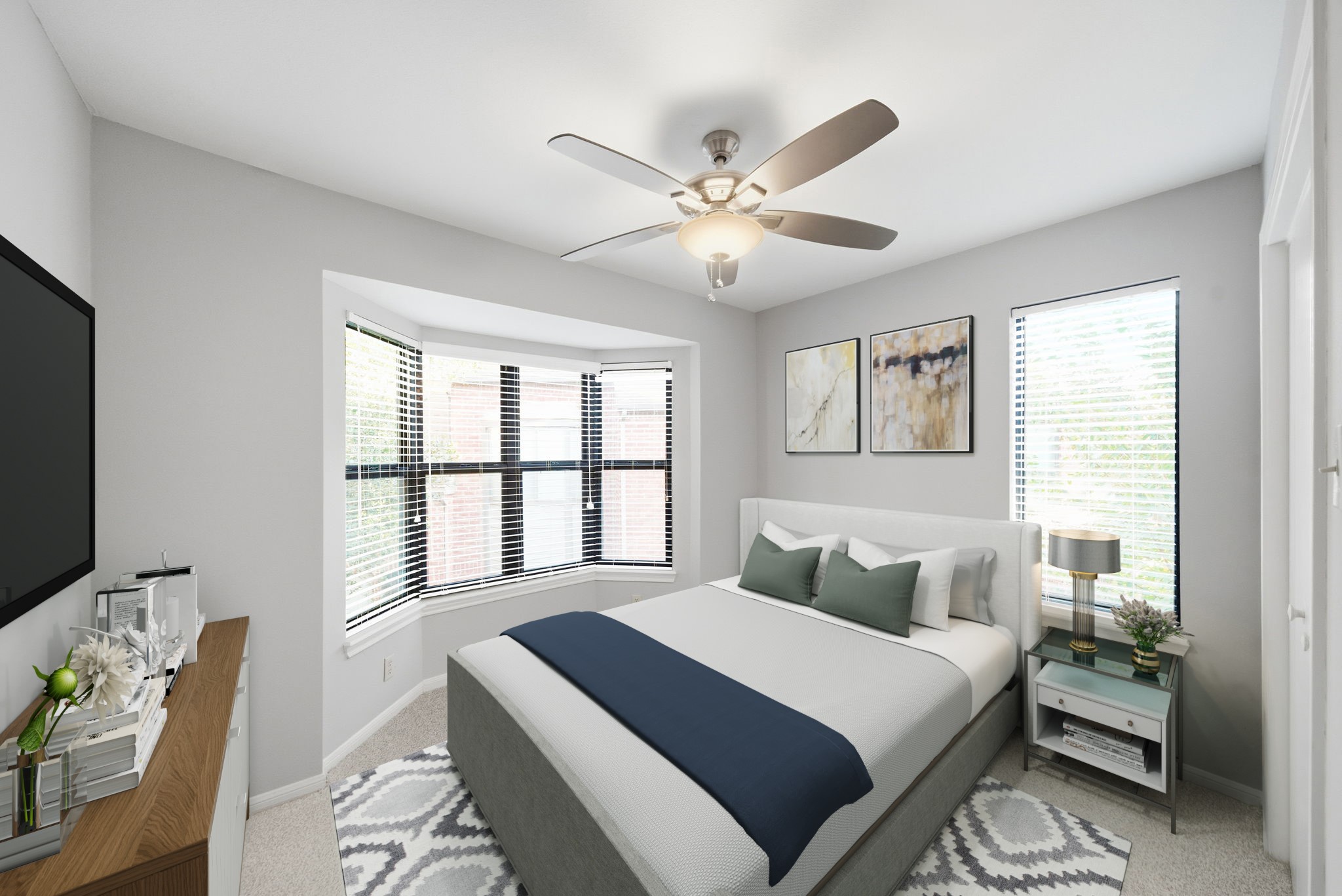 7447 Cambridge Street, Unit 65 Houston, TX 77054 - Photo 7 of 42 a bedroom with a large bed and a window