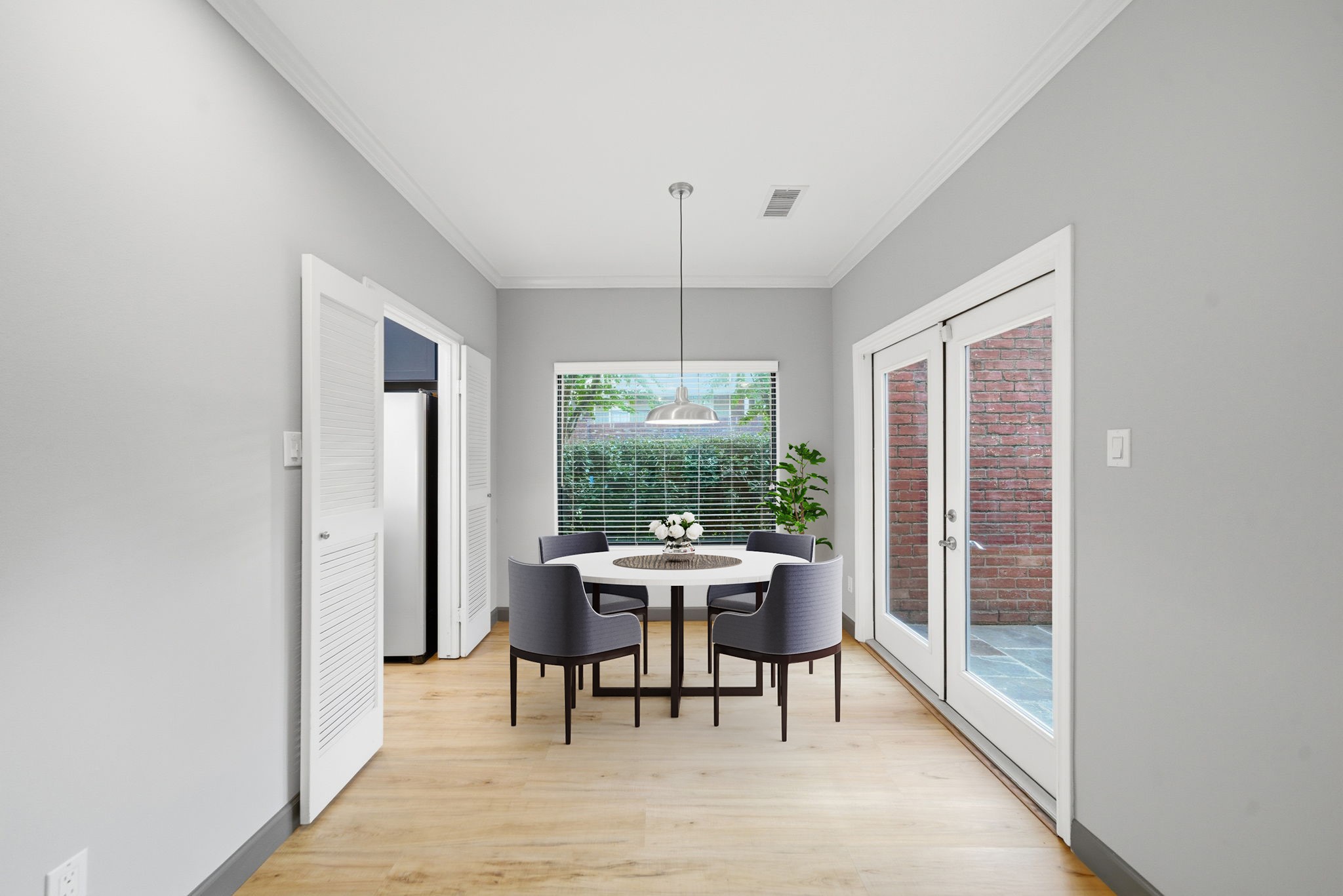 7447 Cambridge Street, Unit 65 Houston, TX 77054 - Photo 8 of 42 a view of a dining room with furniture window and outside view