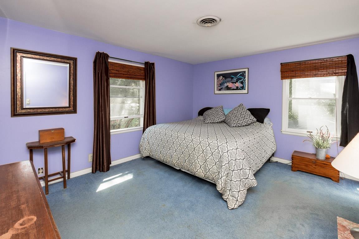 528 Georgetown Road Clarksville, TN 37043 - Photo 18 of 30 a bedroom with a bed and a potted plant