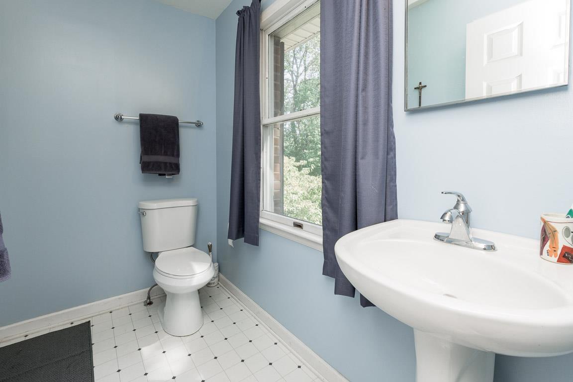 528 Georgetown Road Clarksville, TN 37043 - Photo 19 of 30 a bathroom with a sink toilet and a mirror