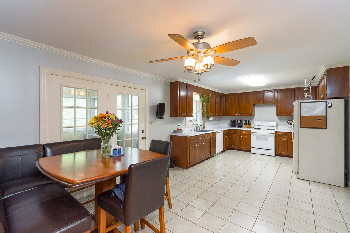 528 Georgetown Road Clarksville, TN 37043 - Photo 5 of 30 a view of a dining room and kitchen with a table and chairs
