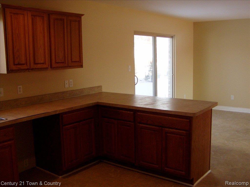 3255 East 11 Mile Road, Unit 7 Warren, MI 48092 - Photo 6 of 11 VIEW TO DOORWALL