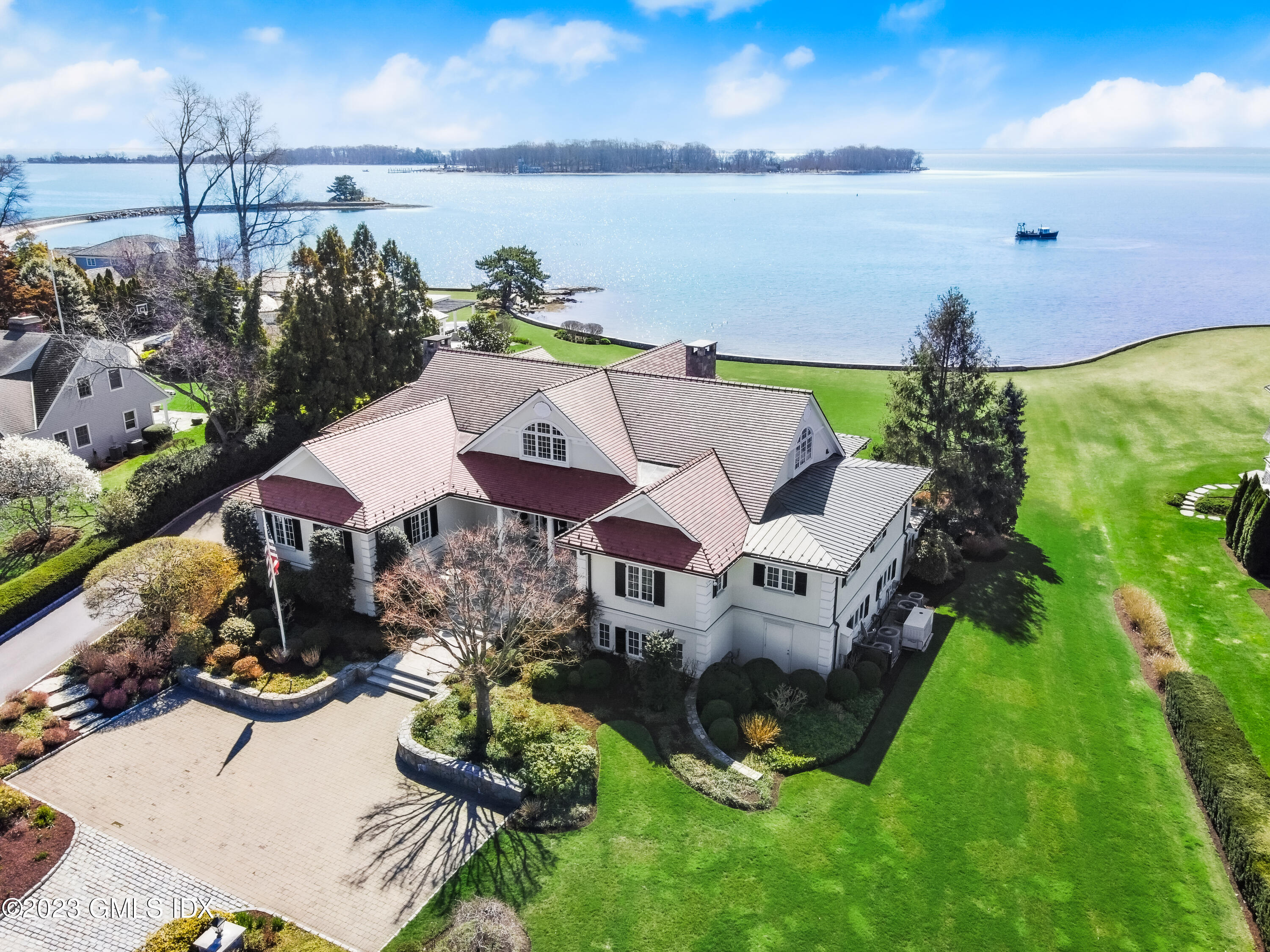 a view of a terrace with chairs and potted plants