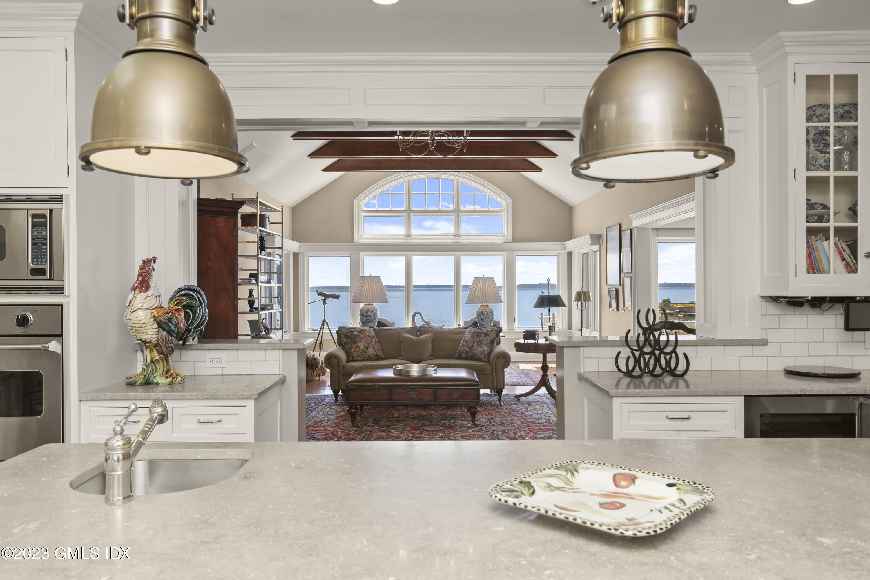 18 Pilot Rock Lane Riverside, CT 06878 - Photo 15 of 50 a living room with furniture and a chandelier