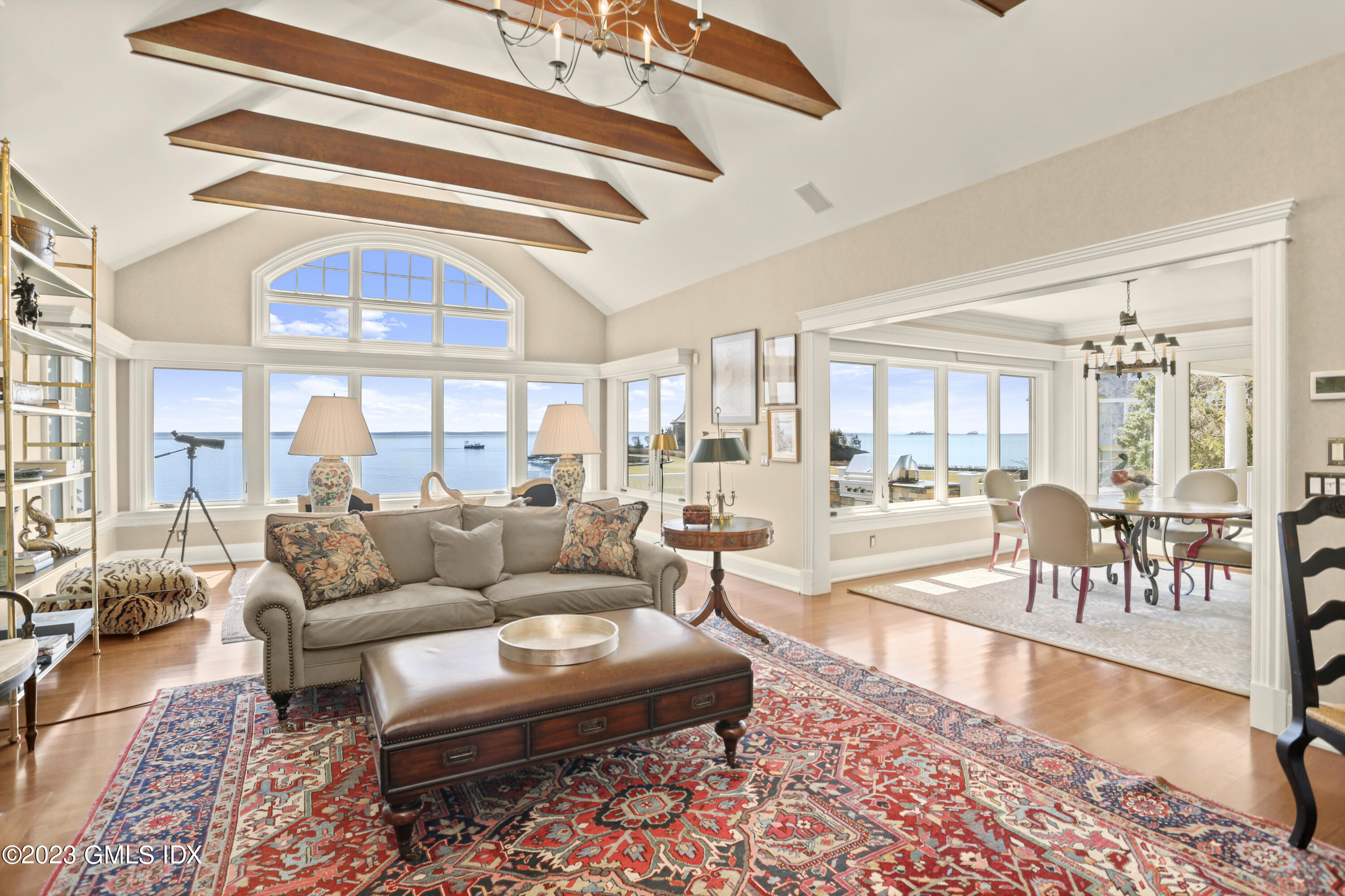 18 Pilot Rock Lane Riverside, CT 06878 - Photo 18 of 50 a living room with furniture and a dining table