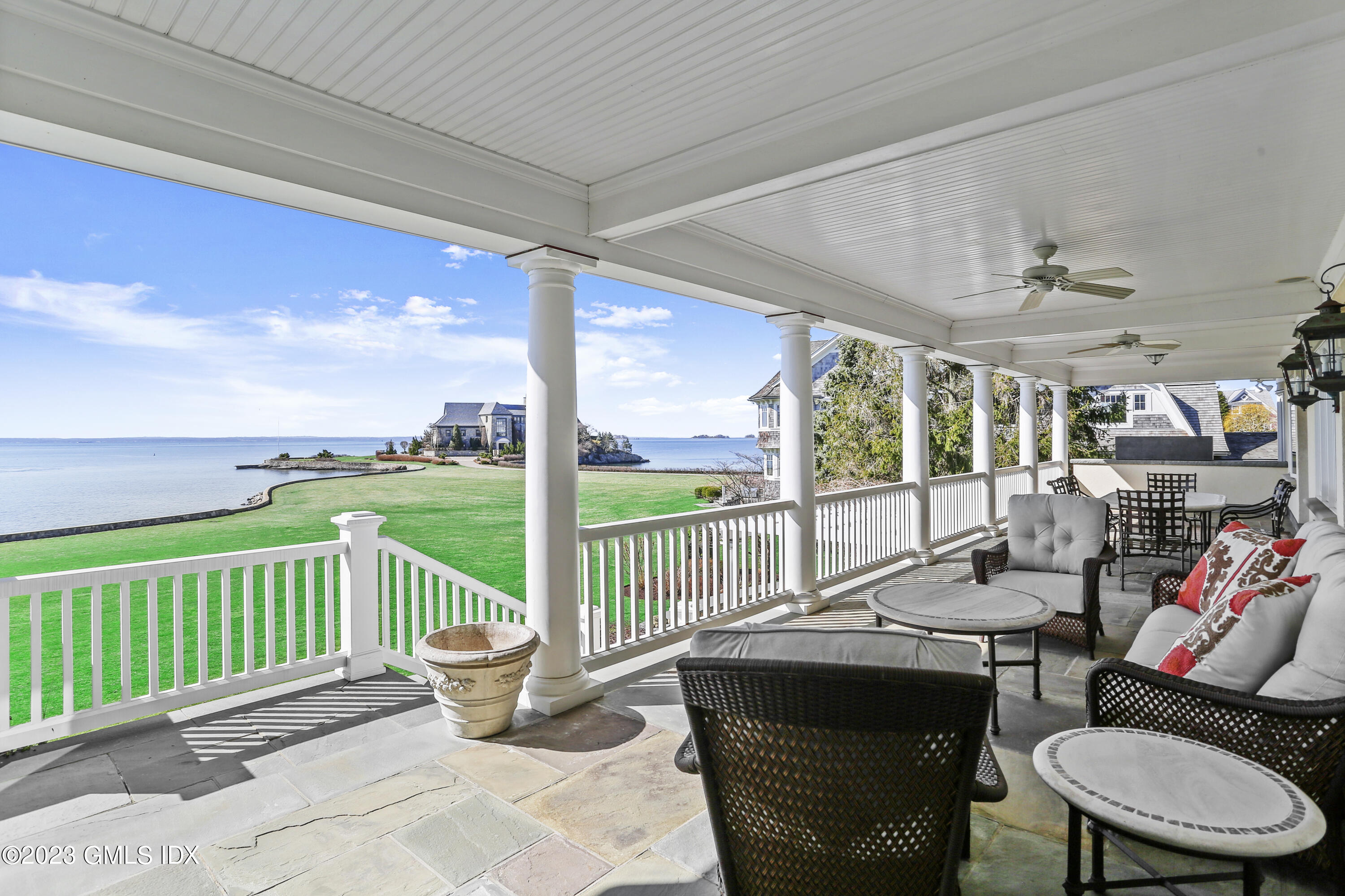 18 Pilot Rock Lane Riverside, CT 06878 - Photo 20 of 50 a view of a porch with furniture