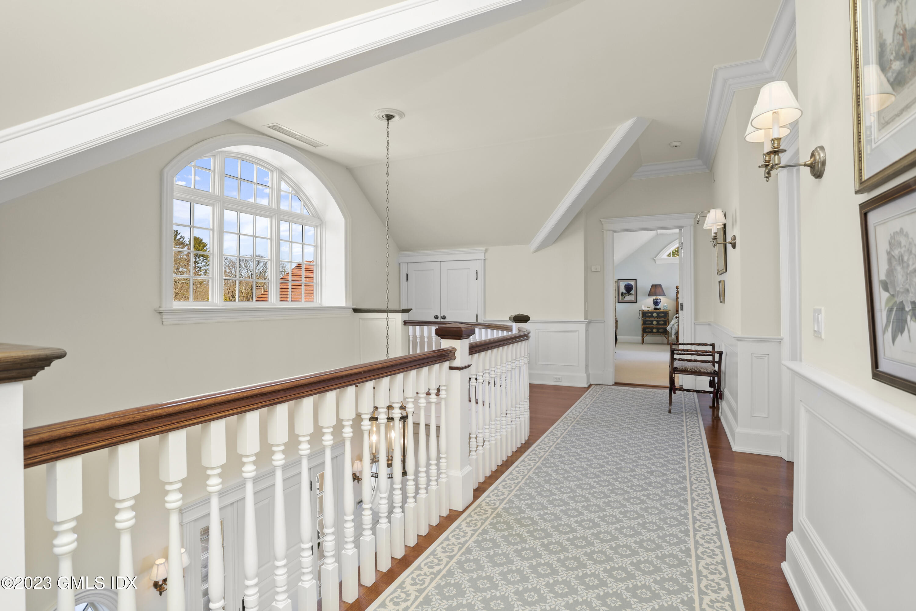 18 Pilot Rock Lane Riverside, CT 06878 - Photo 29 of 50 a view of entryway and hall with wooden floor