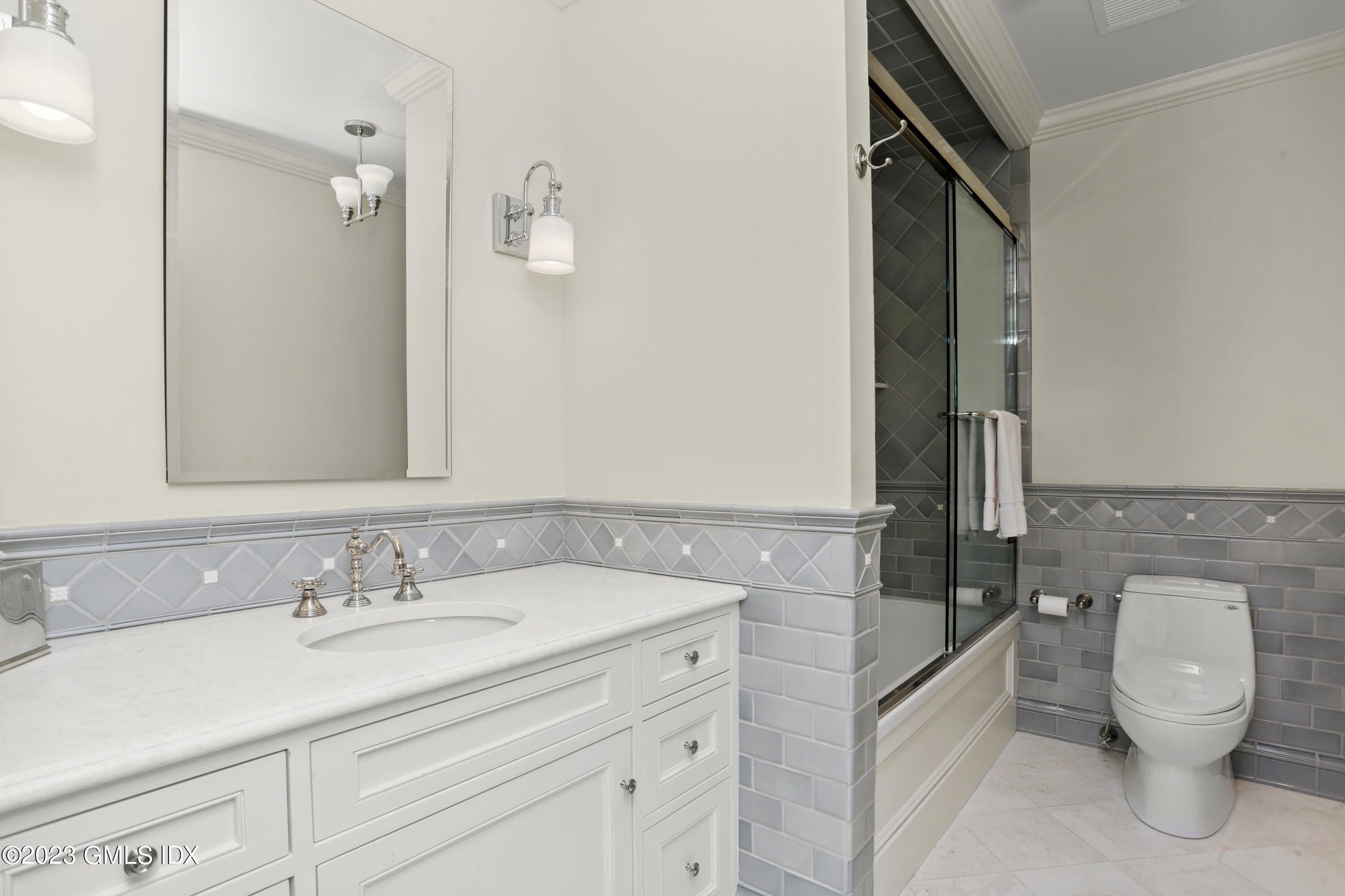 18 Pilot Rock Lane Riverside, CT 06878 - Photo 33 of 50 a bathroom with a sink toilet and shower