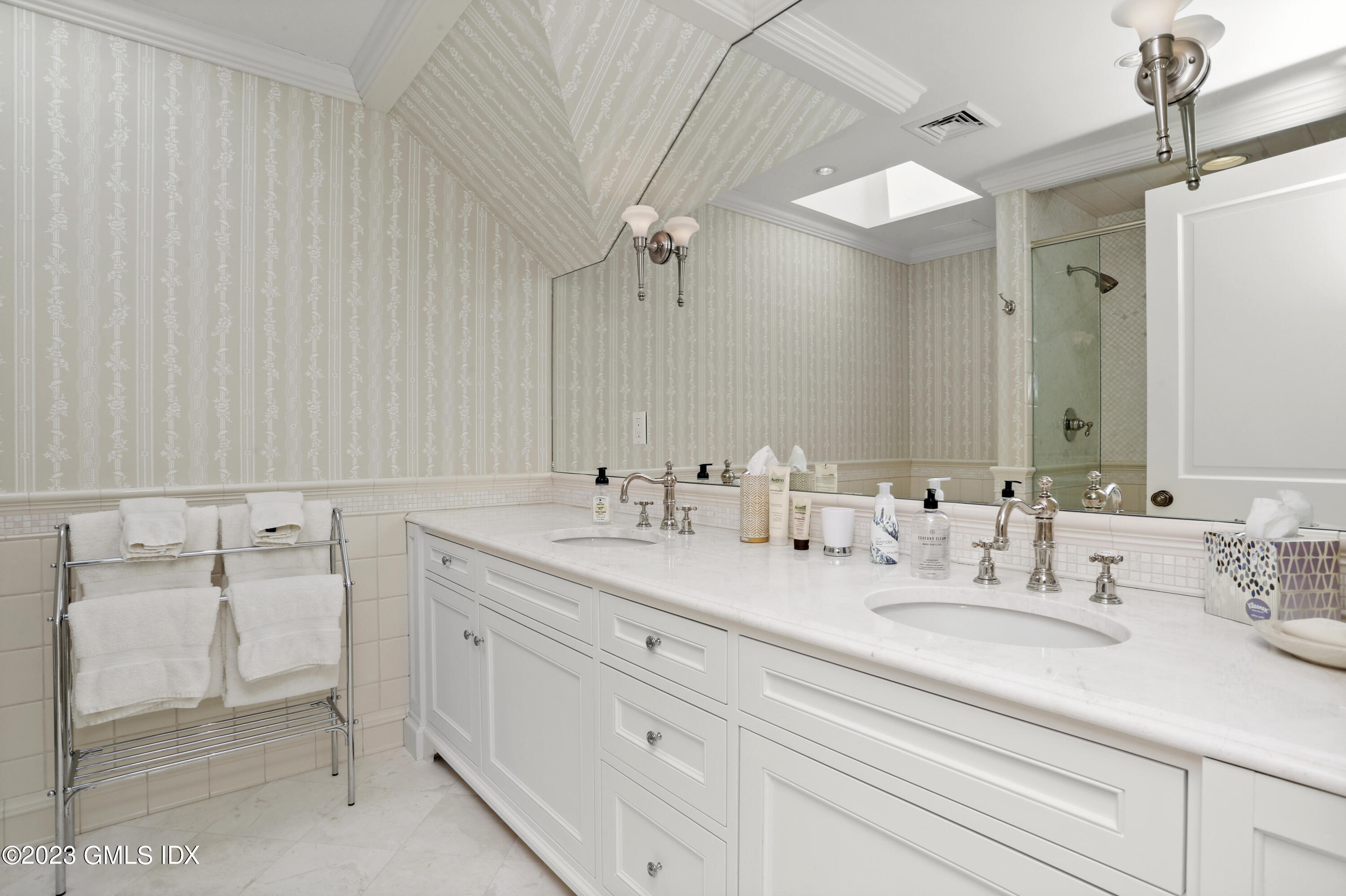 18 Pilot Rock Lane Riverside, CT 06878 - Photo 35 of 50 a bathroom with a sink double vanity and a mirror