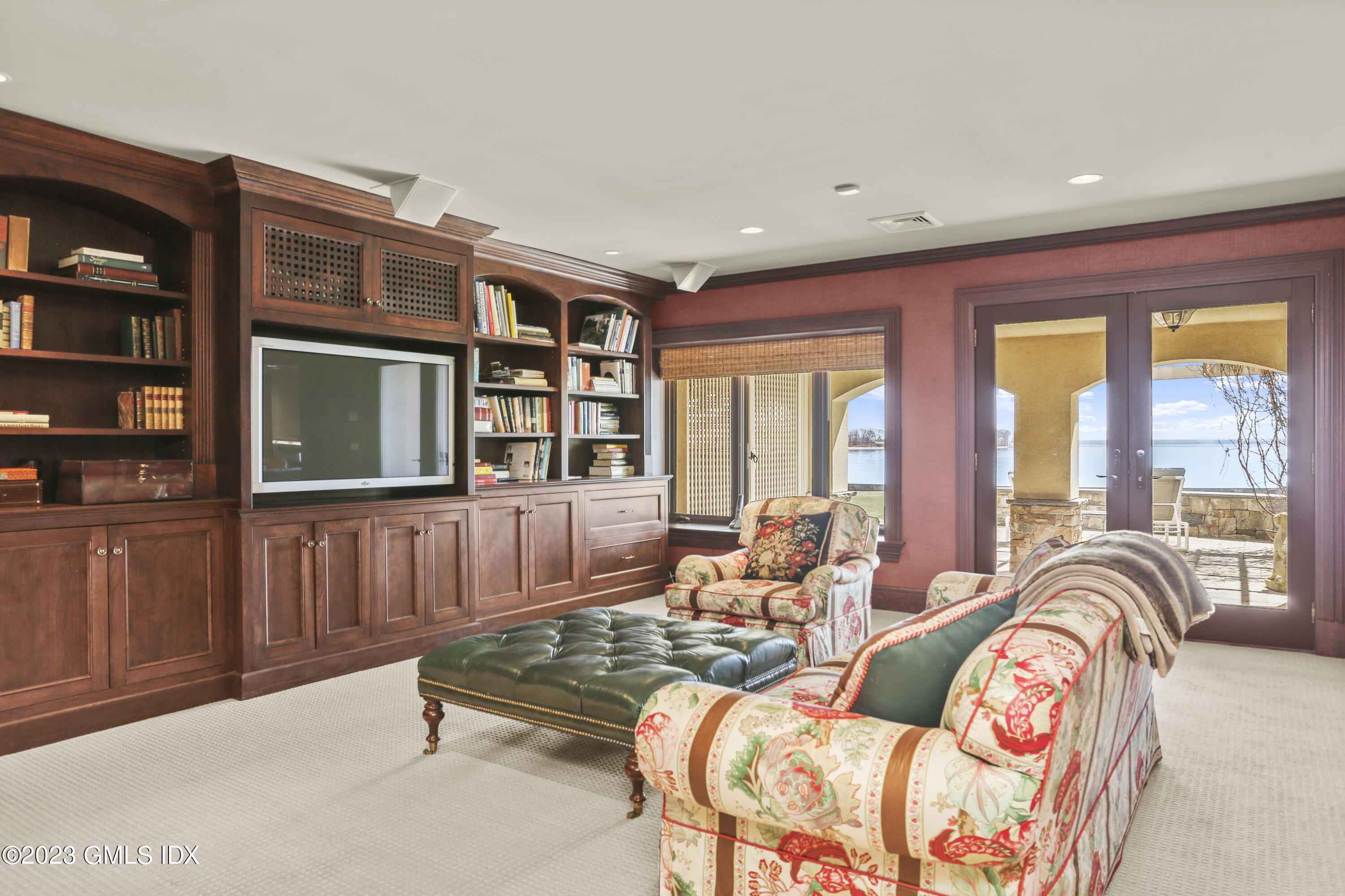 18 Pilot Rock Lane Riverside, CT 06878 - Photo 39 of 50 a living room with furniture and a window
