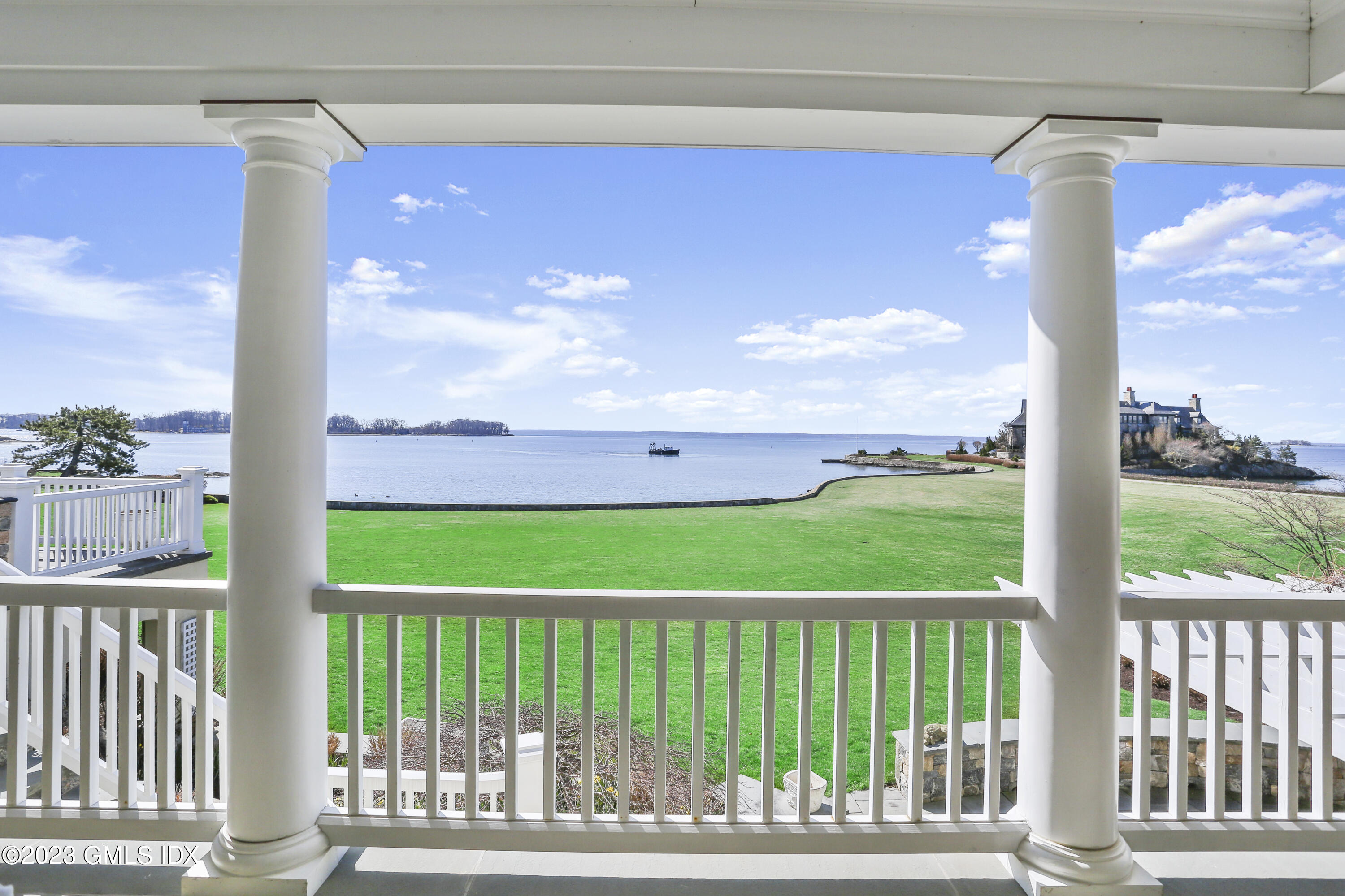 18 Pilot Rock Lane Riverside, CT 06878 - Photo 44 of 50 a view of a porch with a floor to ceiling window