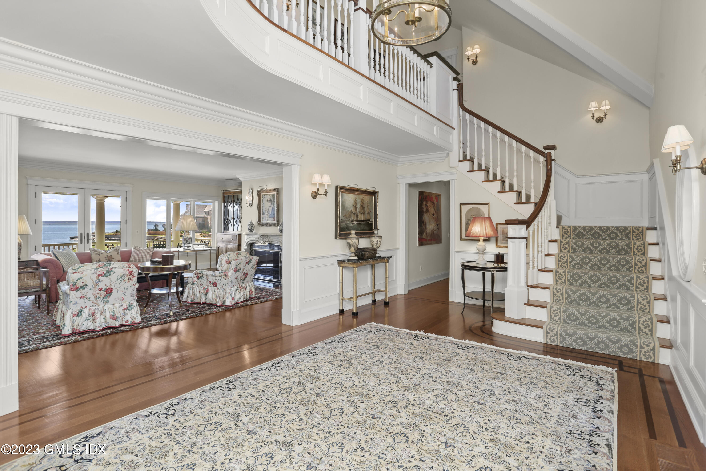 18 Pilot Rock Lane Riverside, CT 06878 - Photo 9 of 50 a view of a livingroom with furniture and wooden floor