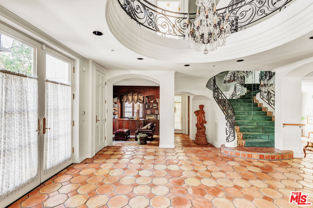 527 North Maple Drive Beverly Hills, CA 90210 - Photo 13 of 54 a view of a entryway door