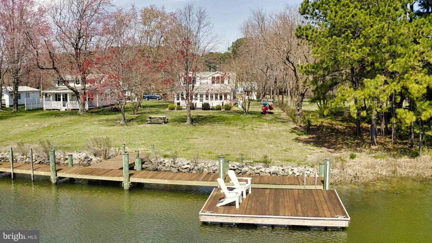 22769 Almost Neavitt Road Bozman, MD 21612 - Photo 15 of 44 a view of a lake with house