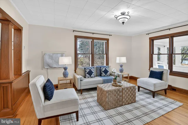 a kitchen with stainless steel appliances a stove a sink a microwave a refrigerator and cabinets