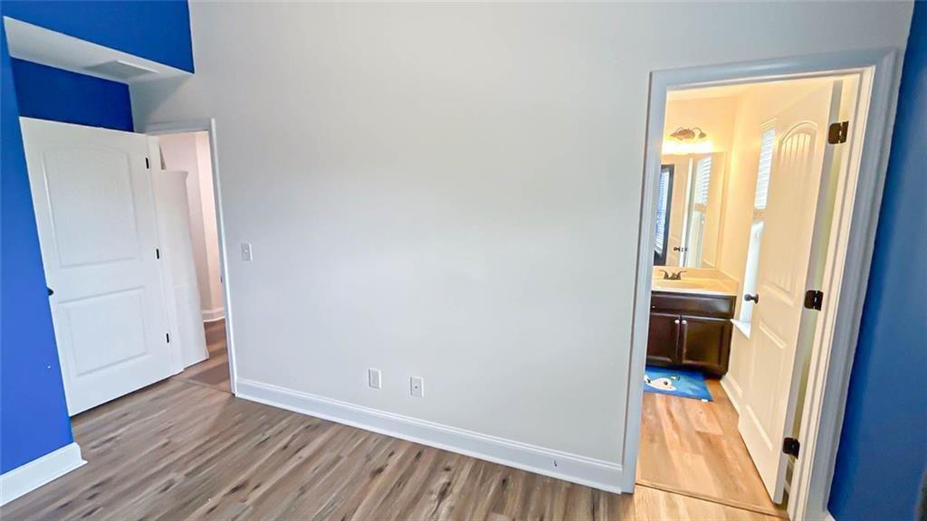 3281 Alhambra Circle Hampton, GA 30228 - Photo 47 of 88 a view of an entryway with wooden floor