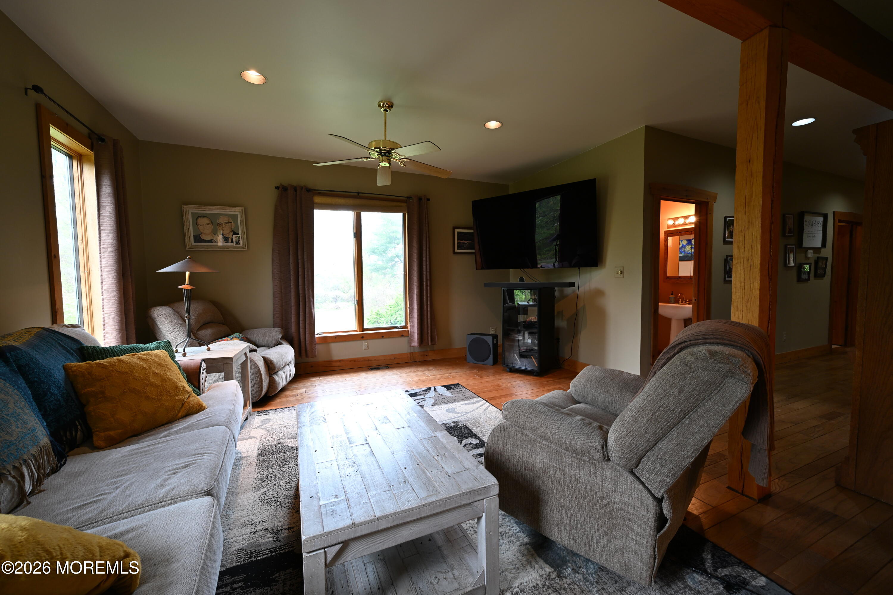 20 Hluchy Road Robbinsville, NJ 08691 - Photo 19 of 38 a bedroom with furniture and a flat screen tv