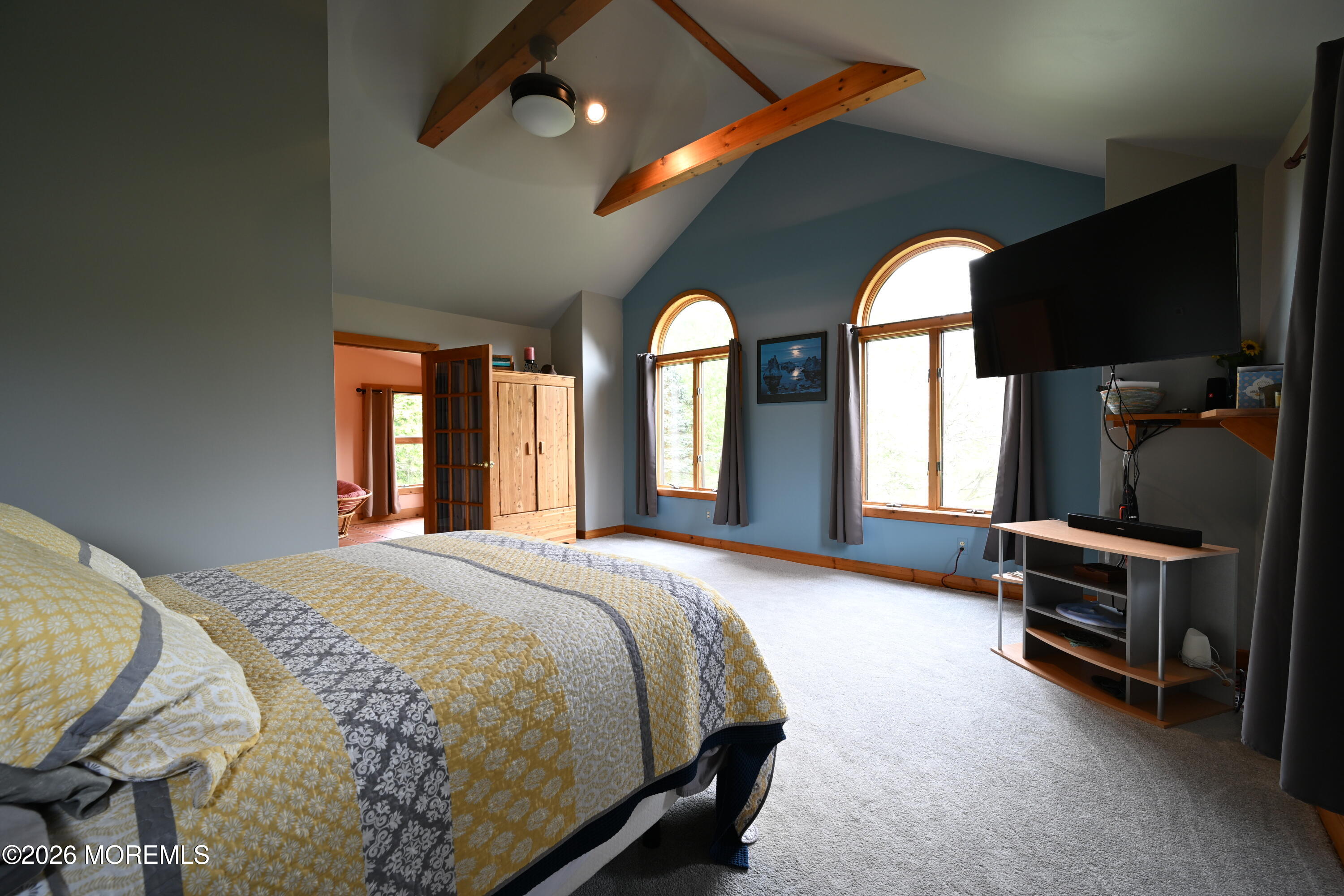 20 Hluchy Road Robbinsville, NJ 08691 - Photo 29 of 38 a bedroom with a large bed and a large window