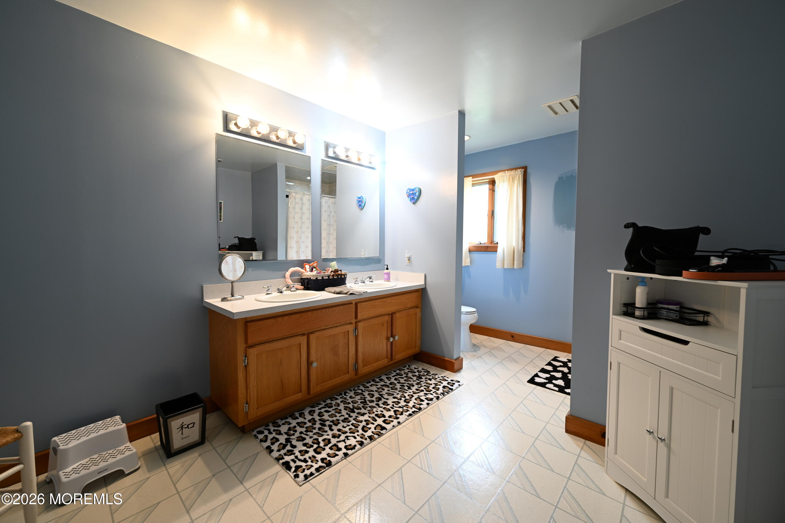 20 Hluchy Road Robbinsville, NJ 08691 - Photo 30 of 38 a kitchen with a sink cabinets and appliances