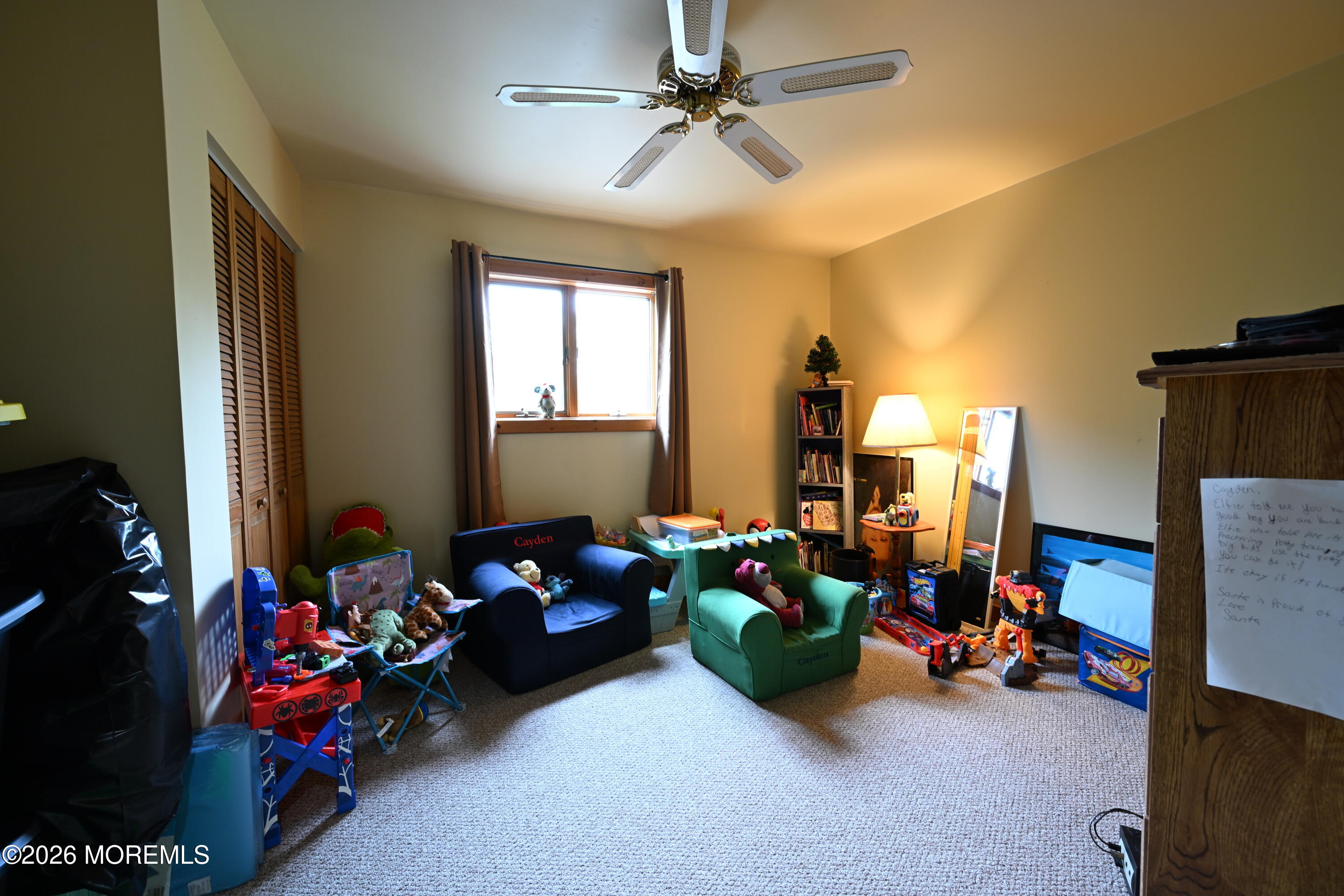 20 Hluchy Road Robbinsville, NJ 08691 - Photo 31 of 38 a living room with lots of furniture and a chandelier