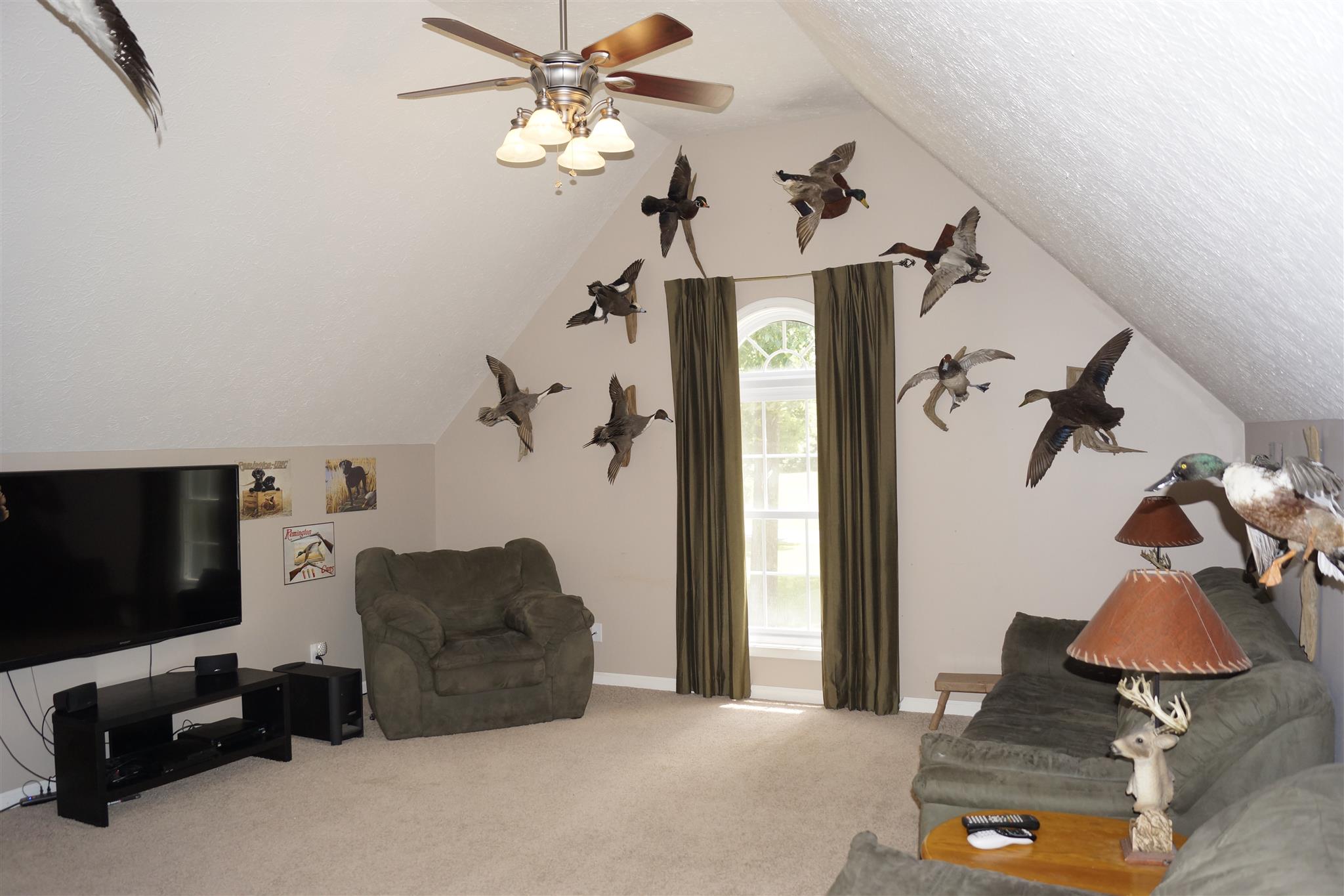 6622 Gum Station Road Springfield, TN 37172 - Photo 3 of 30 a living room with furniture and a chandelier