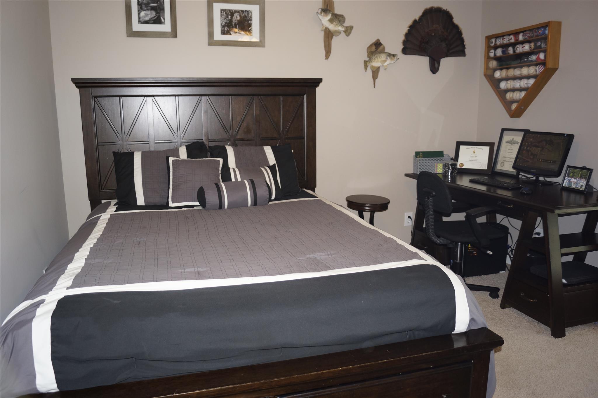 6622 Gum Station Road Springfield, TN 37172 - Photo 23 of 30 a bedroom with a bed and a chandelier