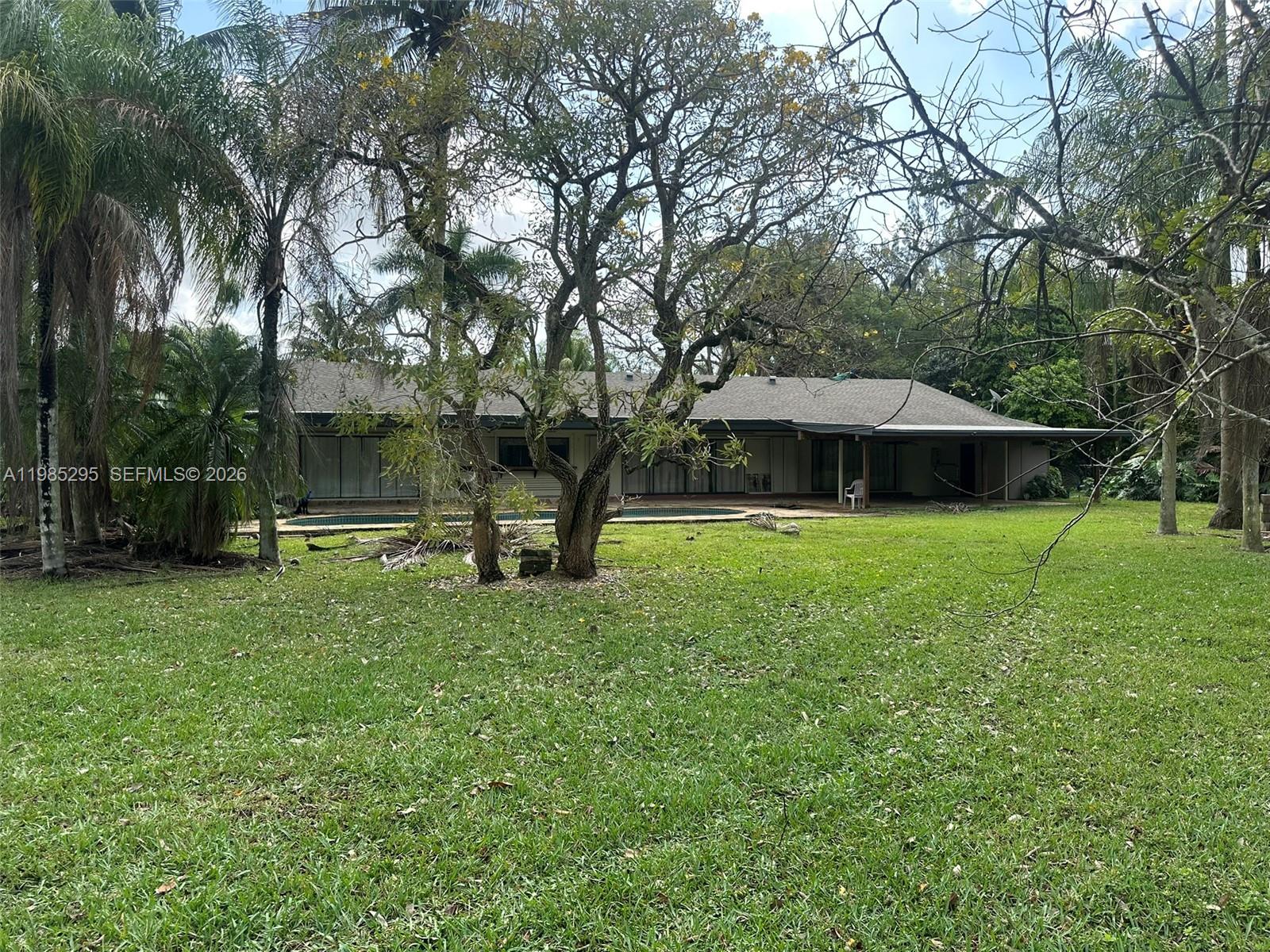 29400 Southwest 179th Avenue Homestead, FL 33030 - Photo 14 of 49 a view of a garden with a slide
