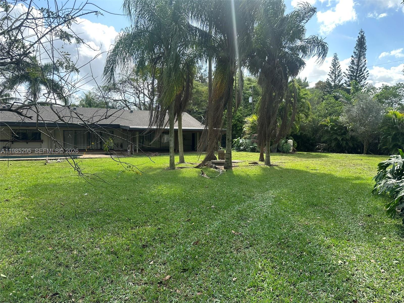 29400 Southwest 179th Avenue Homestead, FL 33030 - Photo 15 of 49 a view of a park with a tree