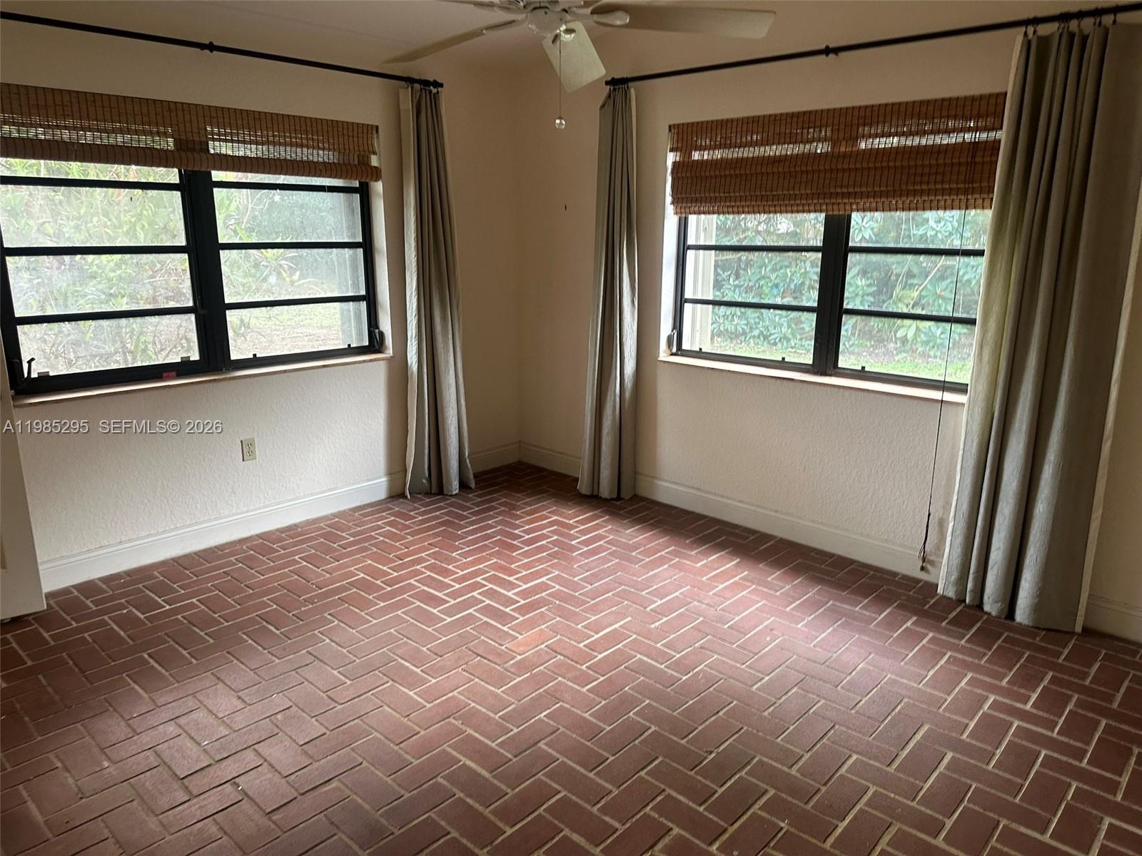 29400 Southwest 179th Avenue Homestead, FL 33030 - Photo 35 of 49 an empty room with windows