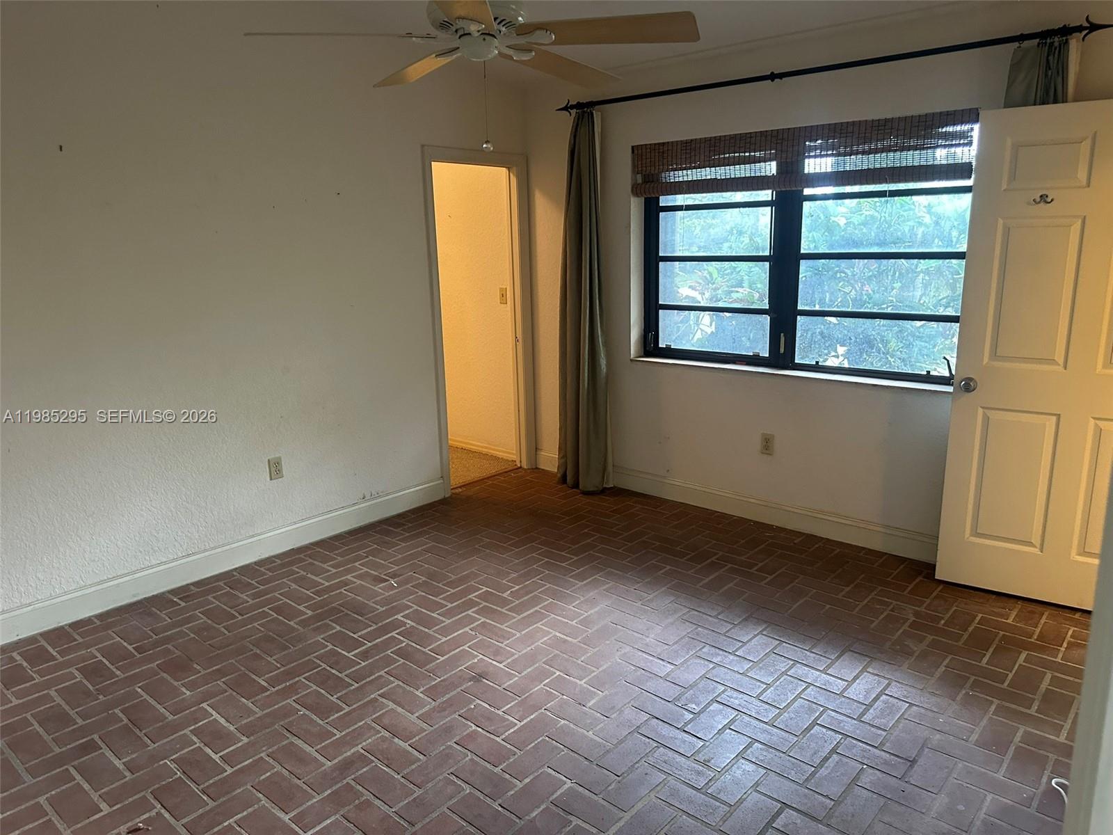 29400 Southwest 179th Avenue Homestead, FL 33030 - Photo 36 of 49 an empty room with windows