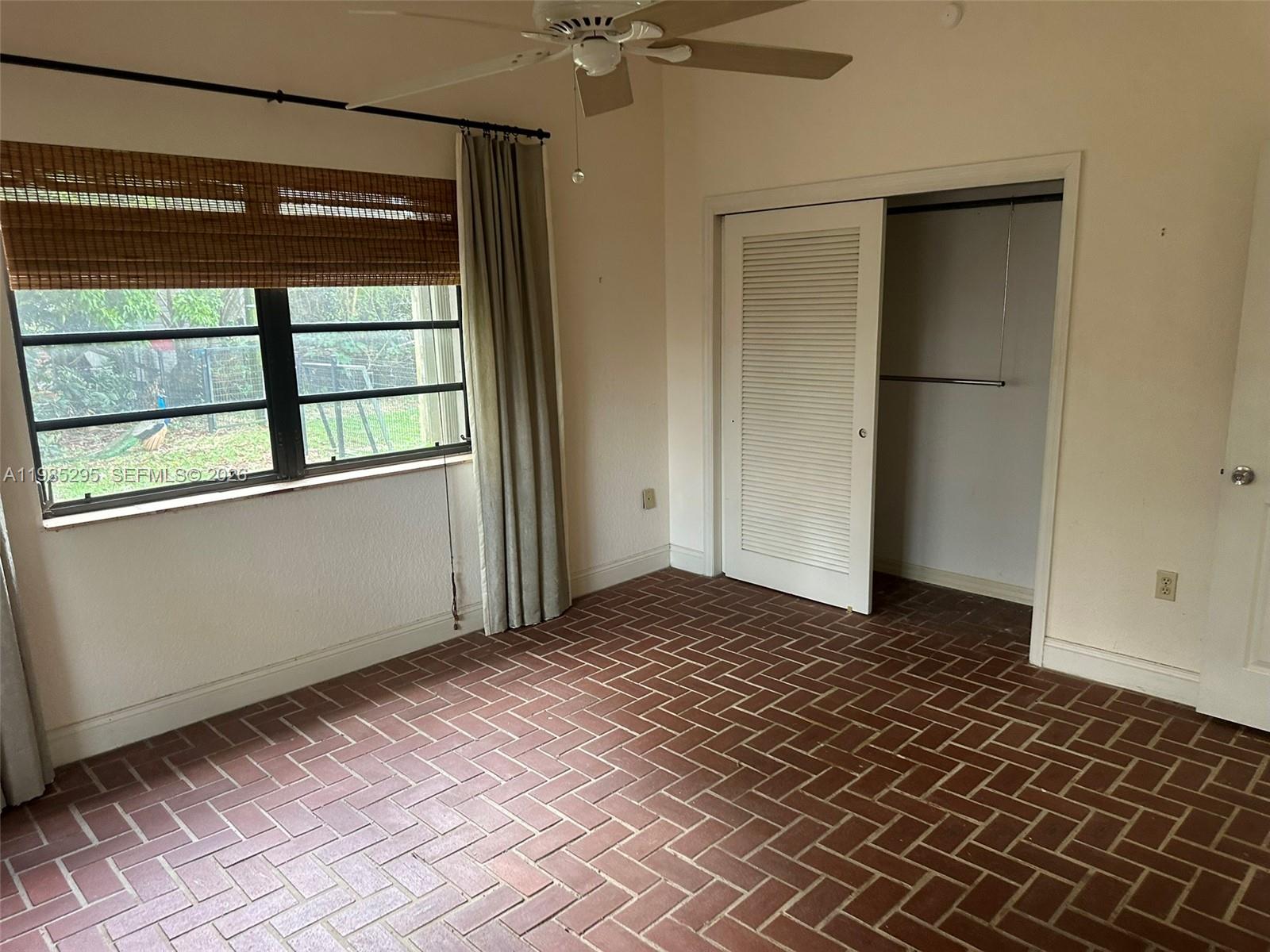 29400 Southwest 179th Avenue Homestead, FL 33030 - Photo 40 of 49 a view of empty room with a window