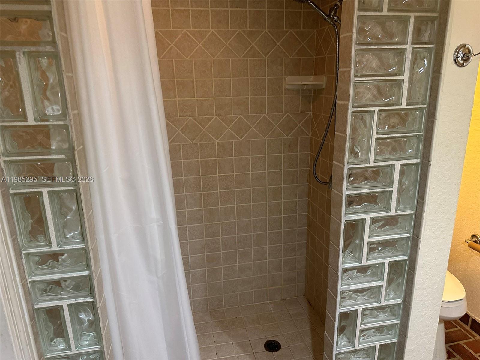 29400 Southwest 179th Avenue Homestead, FL 33030 - Photo 43 of 49 a bathroom with a shower