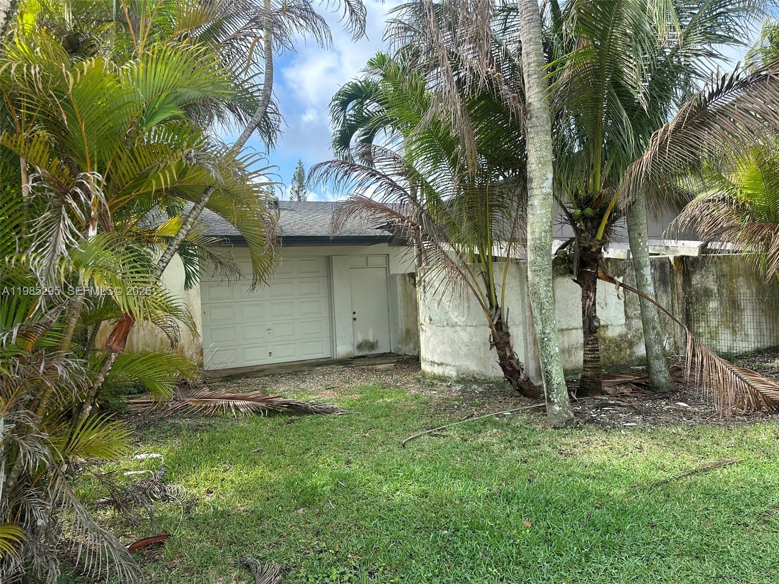 29400 Southwest 179th Avenue Homestead, FL 33030 - Photo 10 of 49 a view of a backyard